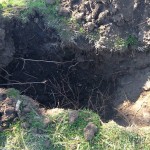 Hole is dug for flagpole installation